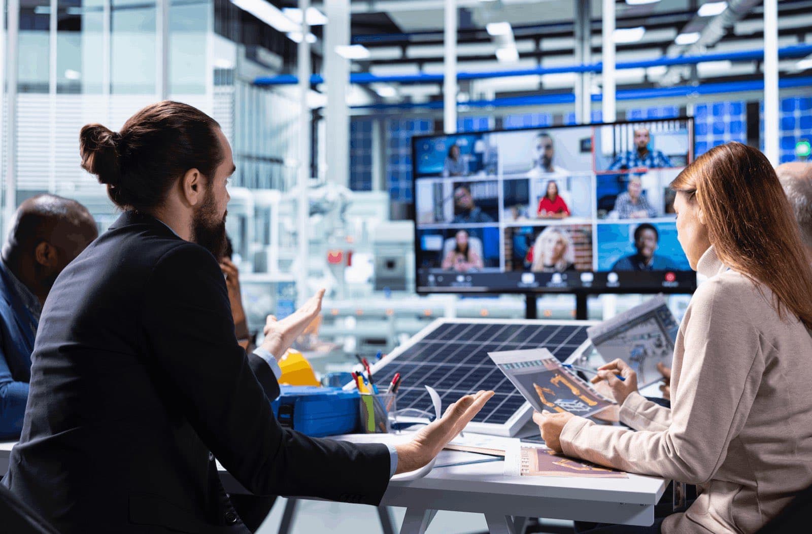 A brand marketing team reviewing AI driven media buying and SEO performance in a strategy meeting
