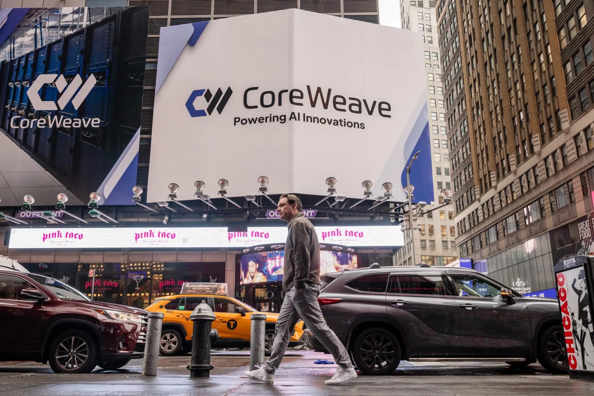 A CoreWeave billboard advertisement in Times Square, New York