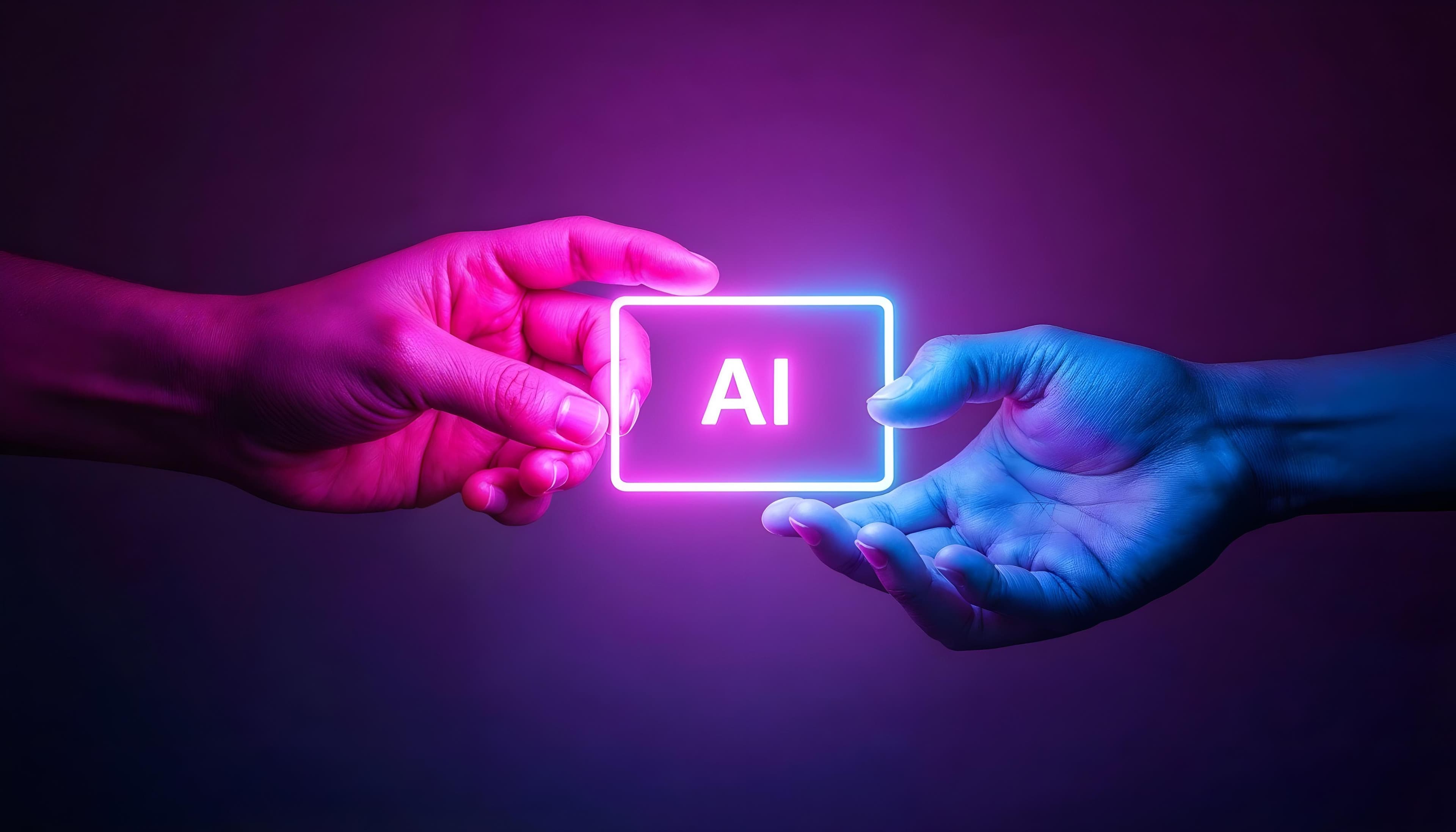 Two illuminated hands passing a glowing neon sign that reads AI against a purple background