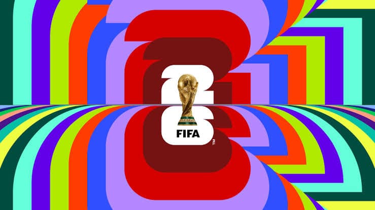 A colourful geometric FIFA World Cup 2026 logo in bold overlapping stripes